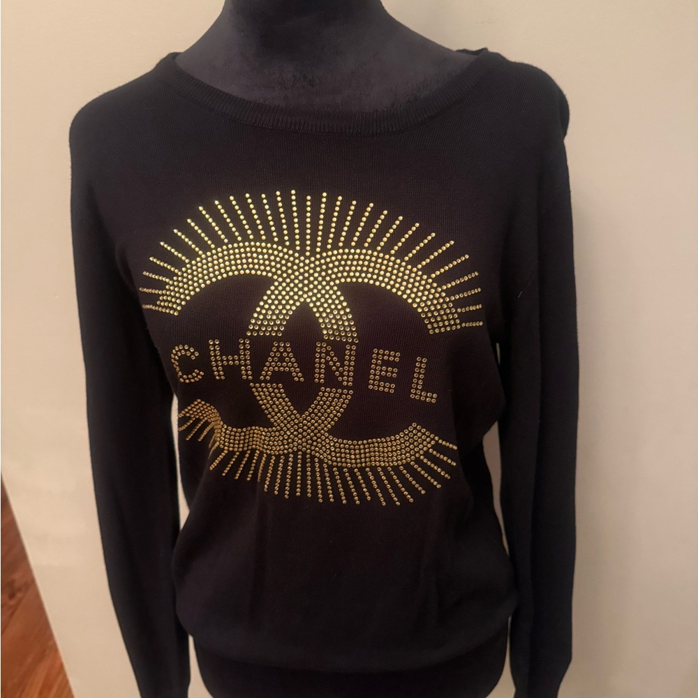 Black Sweater with Gold Accents